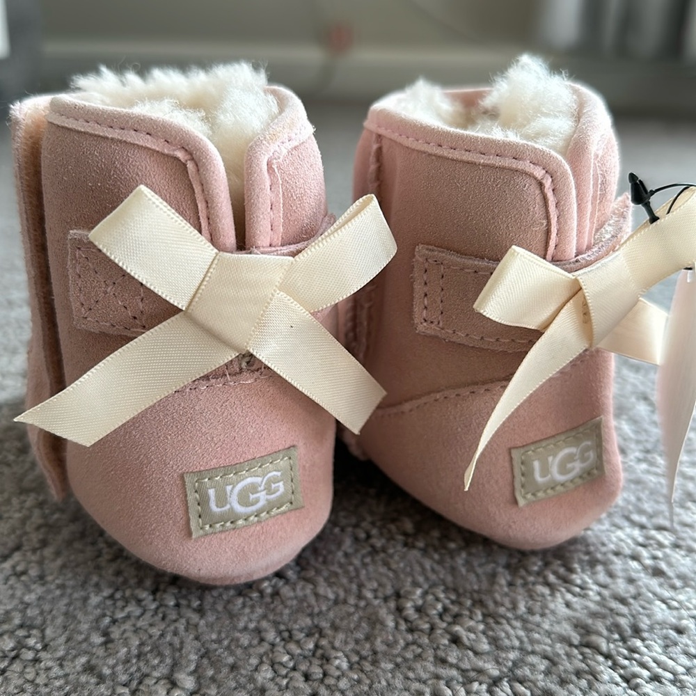 Pink UGG Baby Jesse Bow II with bow. Size 4/5 baby/toddler. Brand new with tags!